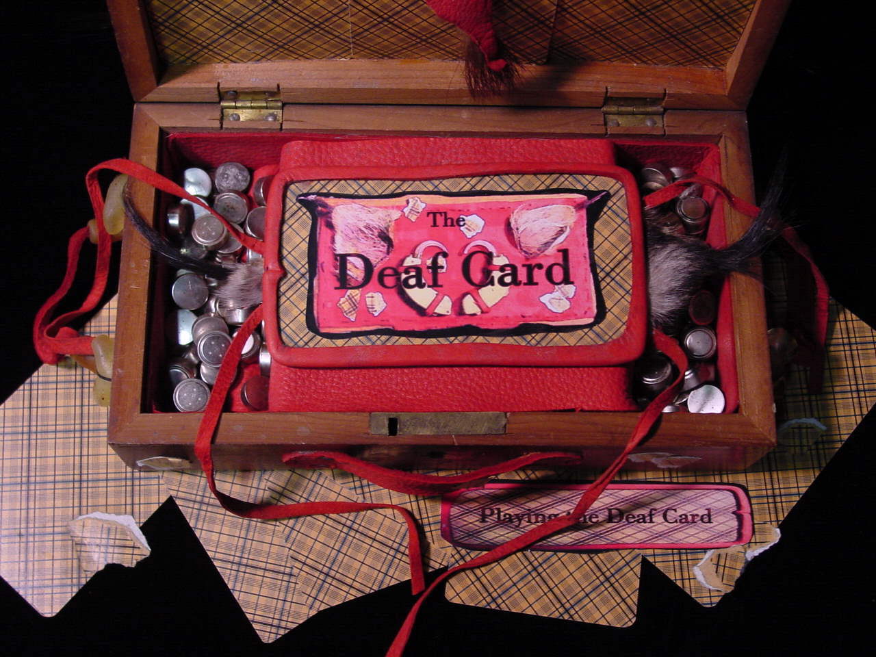 Playing the Deaf Card, detail