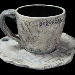 Stretched Steel Cup and Saucer